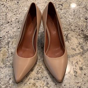 Coach heels.